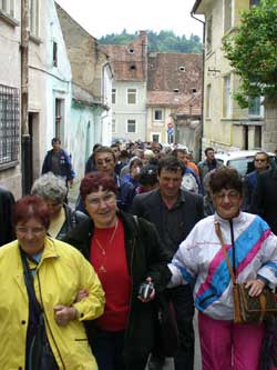 A group of visually impaired people on the streets of Brasov